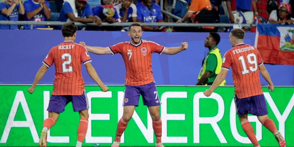 Escócia vence Haiti e vira líder do grupo do Brasil na Copa do Mundo